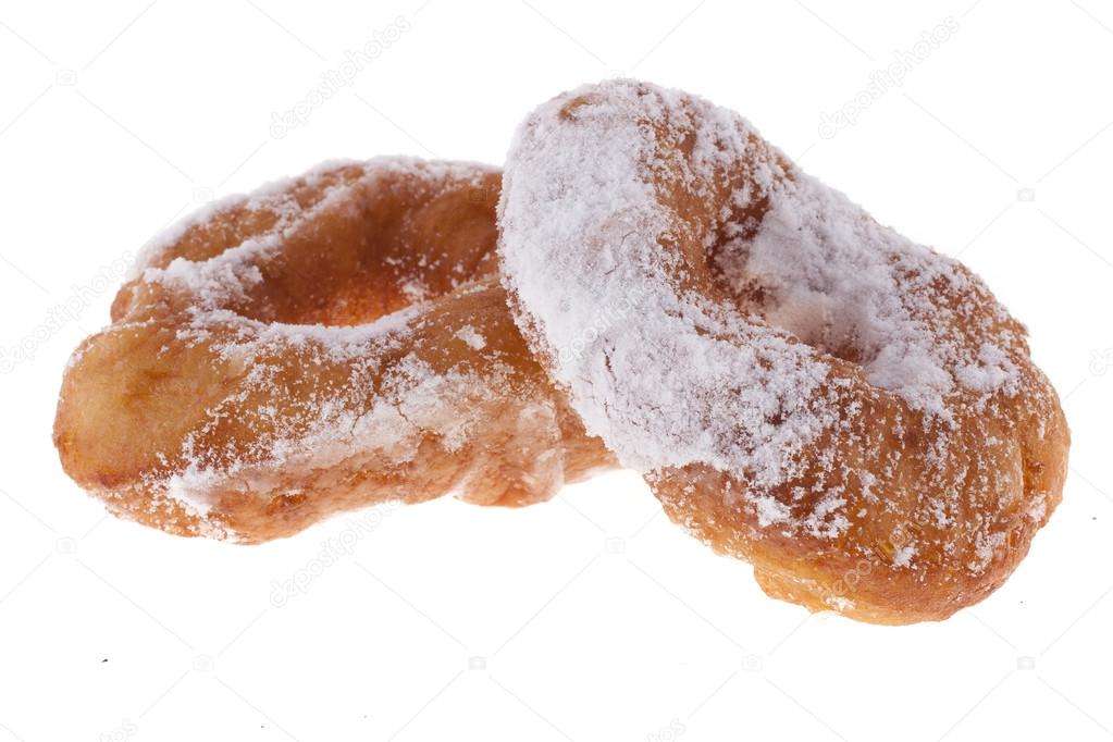 Donuts with powdered sugar on a white background