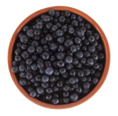 Beyaz arka plan üzerinde izole kahverengi kase yaban mersini