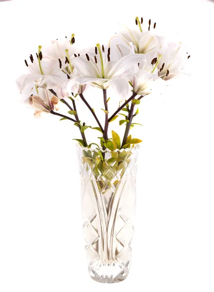 Kytice lilie v křišťálová váza — Stock fotografie