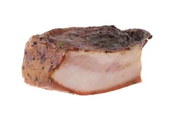 Pedaço de bacon em um fundo branco — Fotografia de Stock