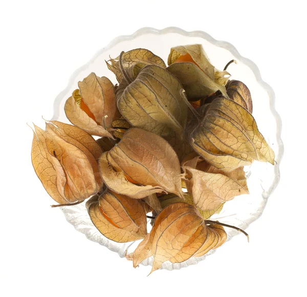 Physalis dans un vase de verre isolé sur fond blanc — Photo