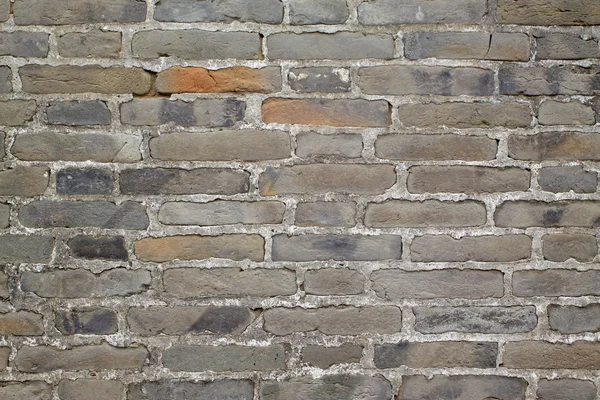 Grijze baksteen muur achtergrond — Stockfoto