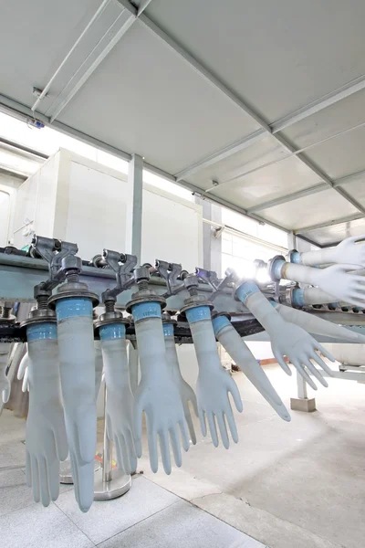 Rubber gloves production line in factory — Stock Photo, Image