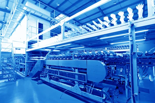 Rubber gloves production line in factory — Stock Photo, Image