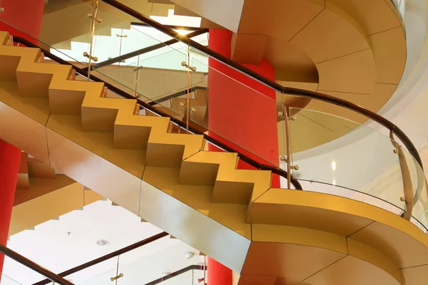 City indoor glass rotary stairs — Stock Photo, Image