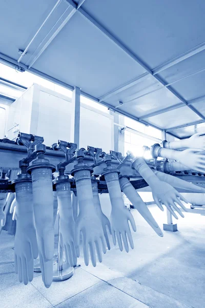 Acrylonitril butadieen handschoenen productielijn in een fabriek, noch Stockfoto