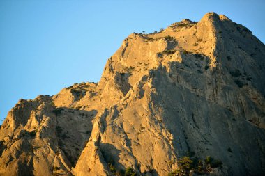 En iyi tatil deniz, dağlar ve güneştir.