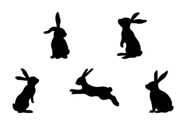 Силуэты кроликов изолированы на белом фоне. Силуэт кролика. — стоковый вектор
