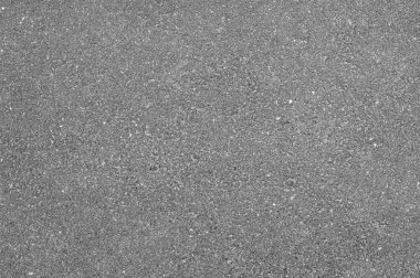 Açık gri asfalt yol dokusu, üst görünüm.