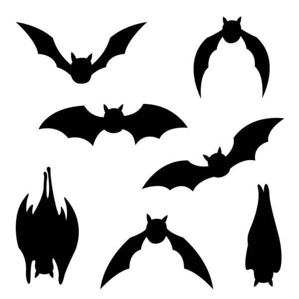 Silhueta preta de um morcego em um branco em poses diferentes. — Vetor de Stock
