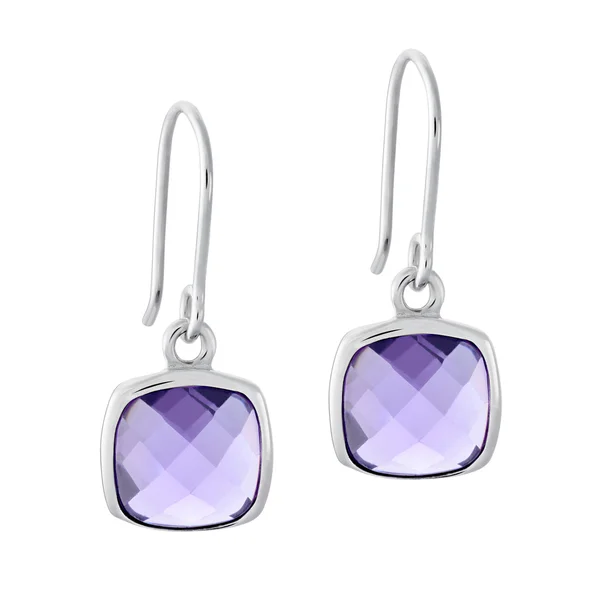 A pair of silver earrings with a gemstone in the form of a square — Stock Photo, Image