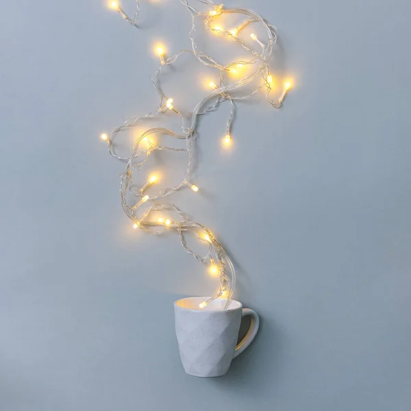 Cup Hot Drink Garland Light Bulbs Gray Background Minimal Winter — Stock Photo, Image