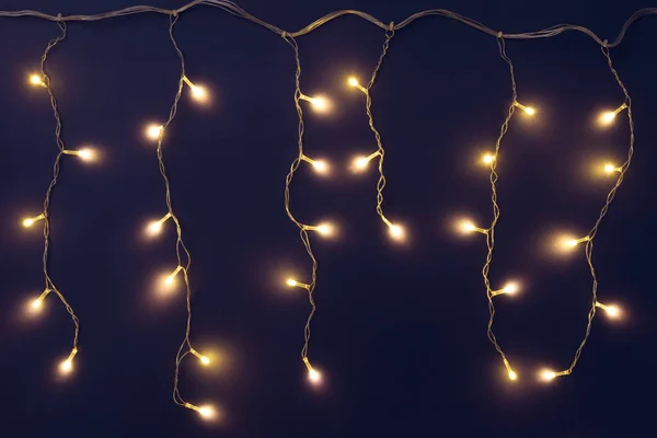 Festive Background Sparkling Garlands Party Lights Glowing Dark Blue Background — Stock Photo, Image
