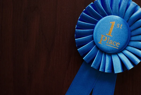 First place winners rosette — Stock Photo, Image