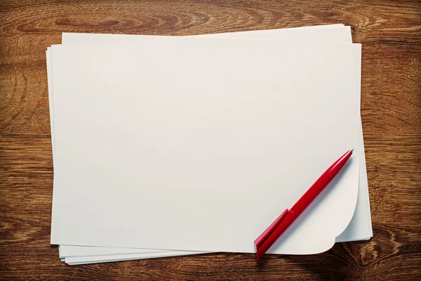 Ballpoint pen lying on sheets of paper — Stock Photo, Image