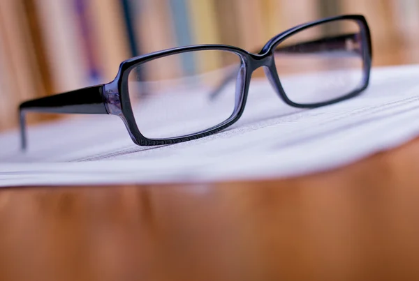 Close up Eyeglasses on Top of White Papers — Stock Photo, Image