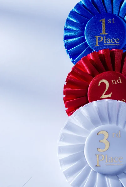Set van drie winnaars rozetten en linten — Stockfoto