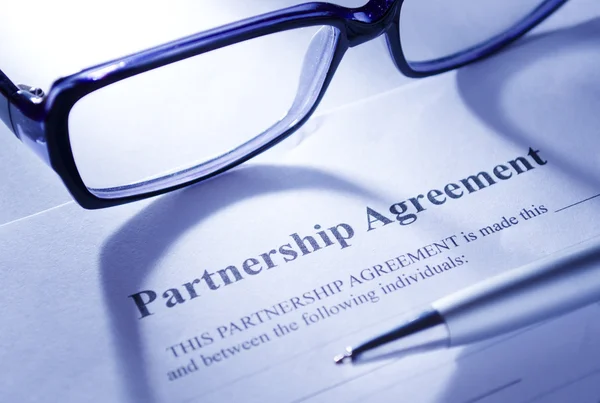 Close up Glasses and Pen on Top of Agreement Paper — Stock Photo, Image
