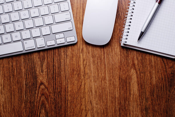 Pen and Notes with Keyboard and Mouse on Table