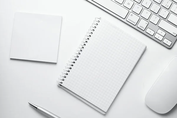 Spiral Notes Surrounded by Office Stuffs on Table — Stock Photo, Image