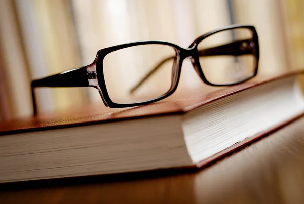 Eyeglasses on Top of the Book — Stock Photo, Image