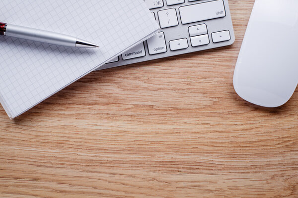 Pen and Notes with Keyboard and Mouse on Table