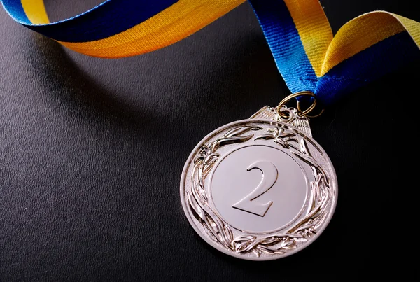 Silver medal on dark — Stock Photo, Image
