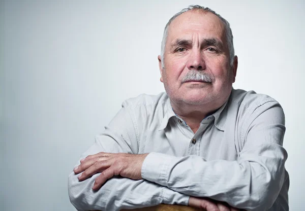 Close-up portrait of a Caucasian senior man with mustache — Stock Photo, Image