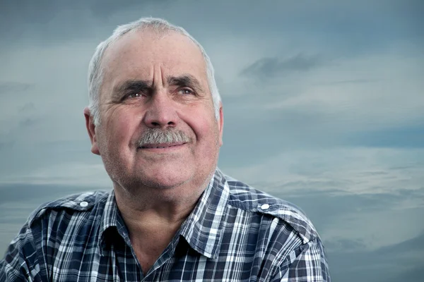 Close-up portrait of a Caucasian senior man with mustache — Stock Photo, Image