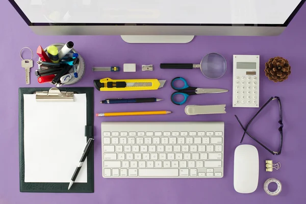 View from above on the well organized working space at the office with keyboard, computer mouse notepad, office supplies. — Stock Photo, Image