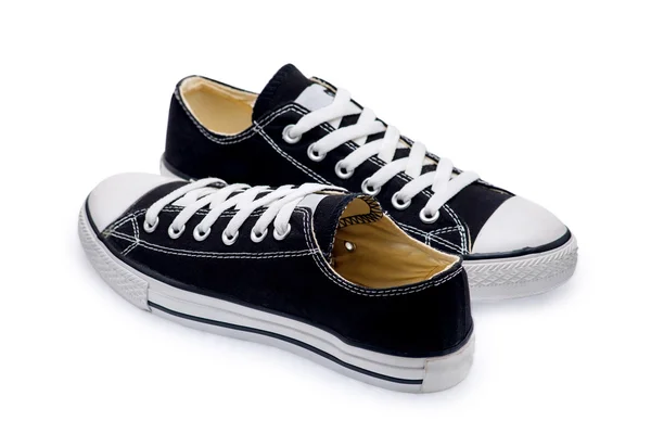 Un par de zapatos de goma negros con cordones —  Fotos de Stock