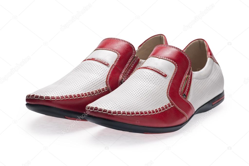 A pair of red-white male shoes without laces
