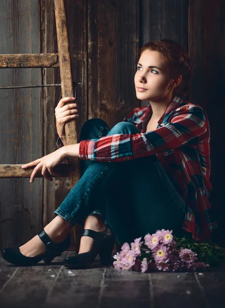 Country girl with flowers — Stock Photo, Image