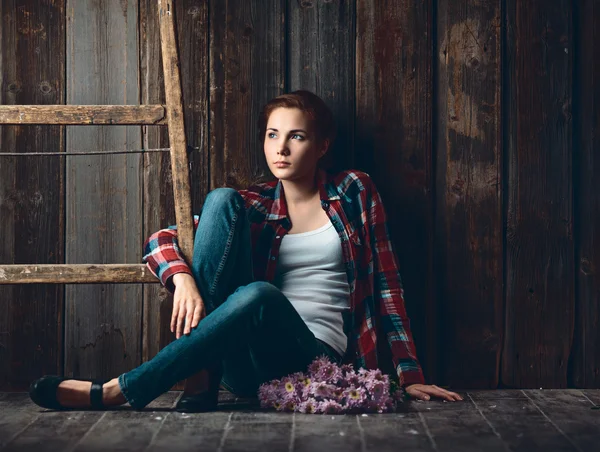 Country girl with flowers — Stock Photo, Image