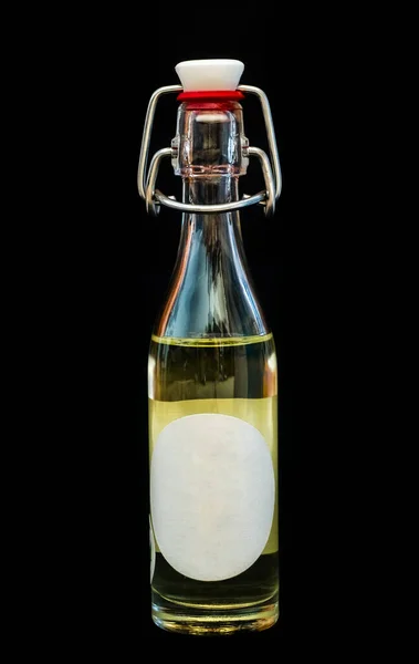 Una Botella Aceite Con Una Etiqueta Blanco —  Fotos de Stock