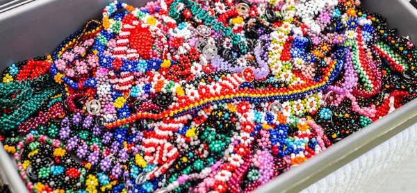 rainbow of colorful beaded necklaces and bracelets