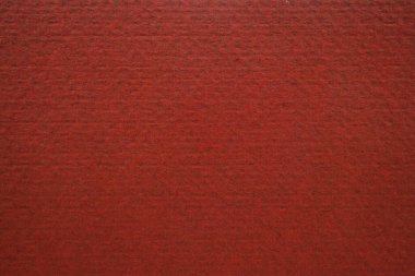 Kalıplı yüzeyi olan yoğun bir sanayi kağıdı.