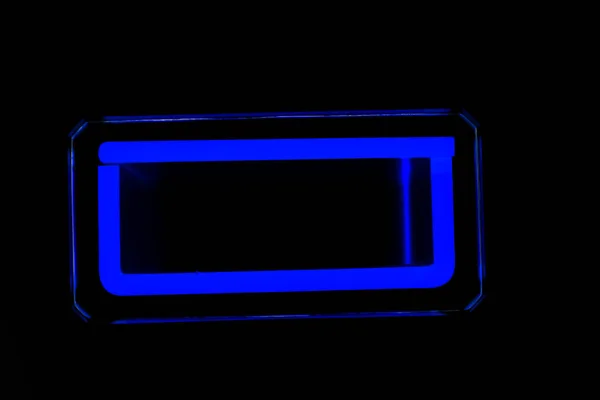 Niebieski Neon Kształt Czarnym Tle — Zdjęcie stockowe