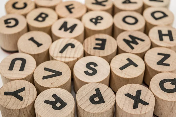 Printed letters on wooden stamps