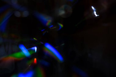 Soyut hareket koyu arkaplanda odaklanmış ışıkları kapatır