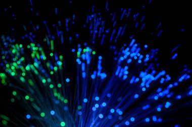Fiber optik geniş bant teknolojisi konsept bokeh arka plan bulanık.