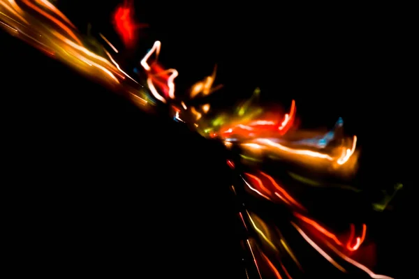 Movimiento Abstracto Luces Desenfocadas Sobre Fondo Oscuro — Foto de Stock