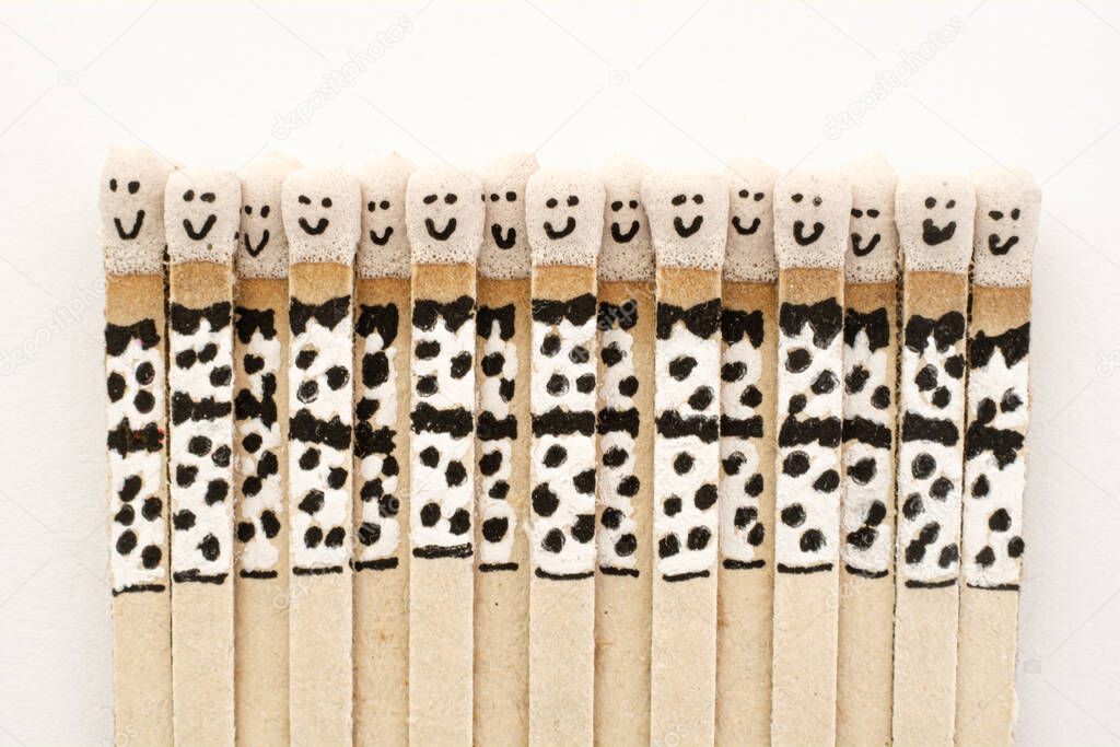 matchsticks on a white paper