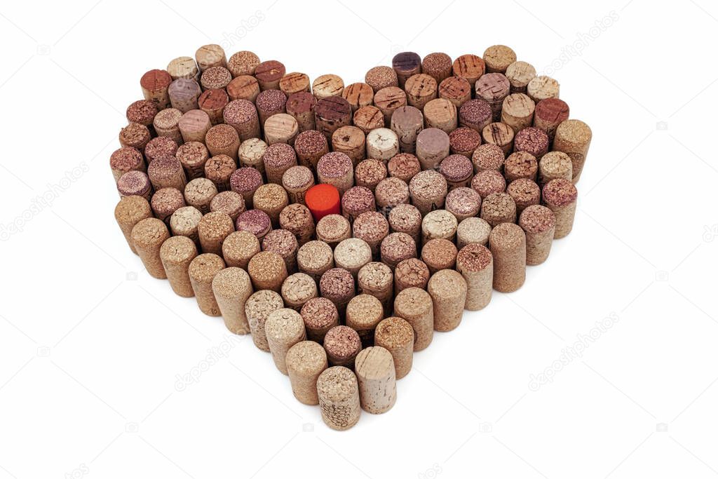 Old Used corks plugs from various types of wine arrange in heart shape