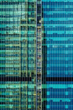 Modern ofis binasının pencereleri. Shanghai, Çin 'de cam bina gökdeleni dokusu