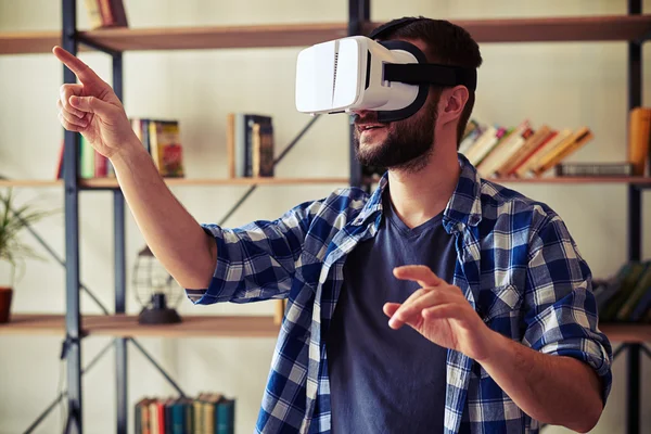 Man touch something using virtual reality headset — Stock Photo, Image