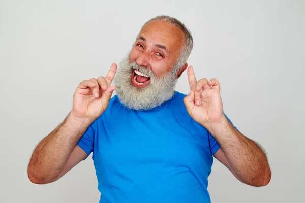 Senior stilvollen Mann posiert vor der Kamera Ausdruck von Glück und — Stockfoto