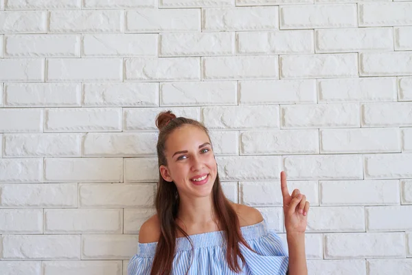 Close-up of pretty girl holding thumb-up — Stock Photo, Image