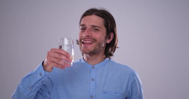 Man drinking a glass of water — Stock Video