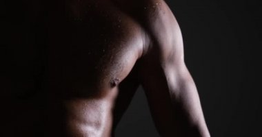 Shirtless muscular man in studio